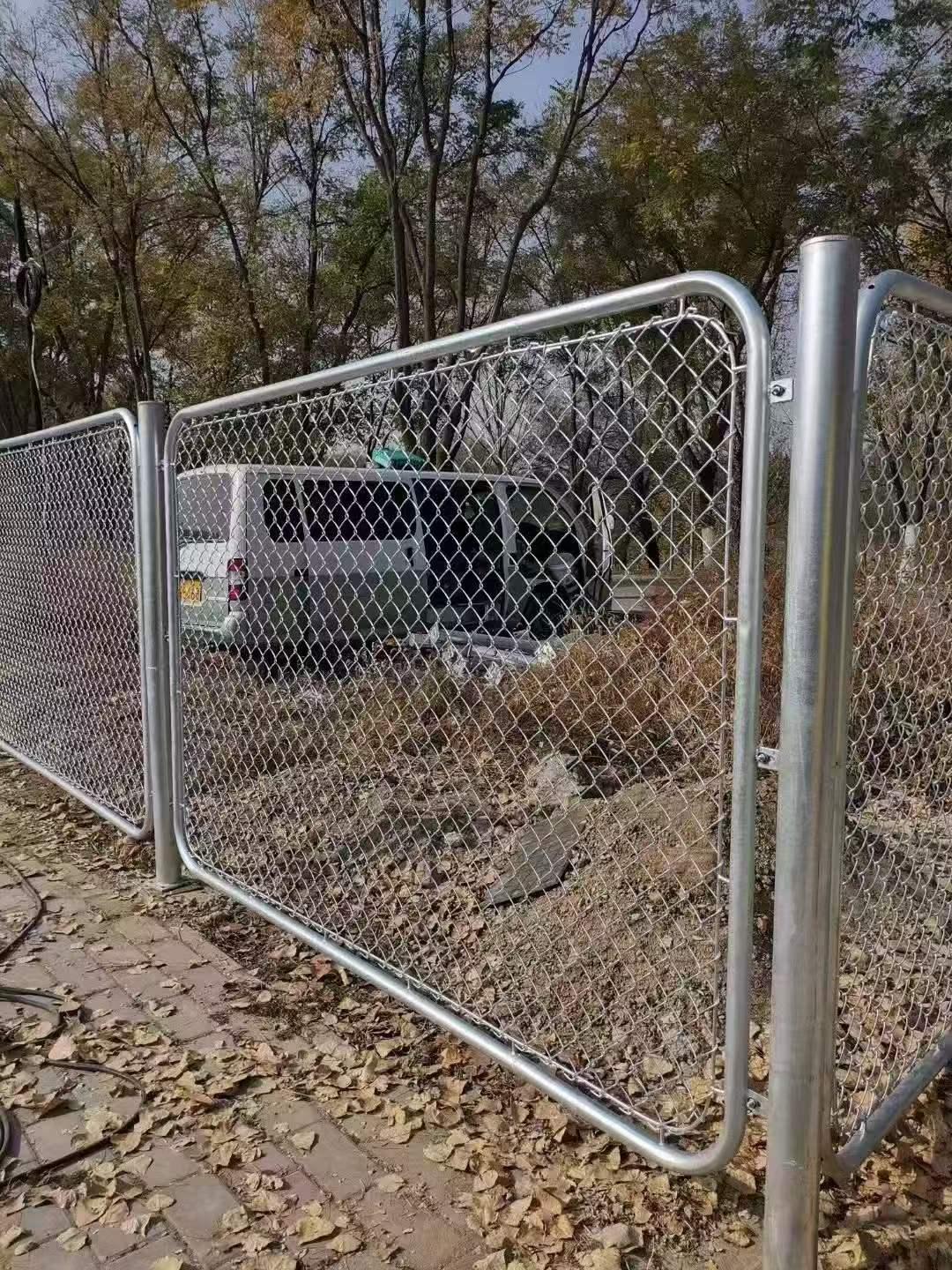 Hot-dip galvanized chain link fence installed at industrial facility
